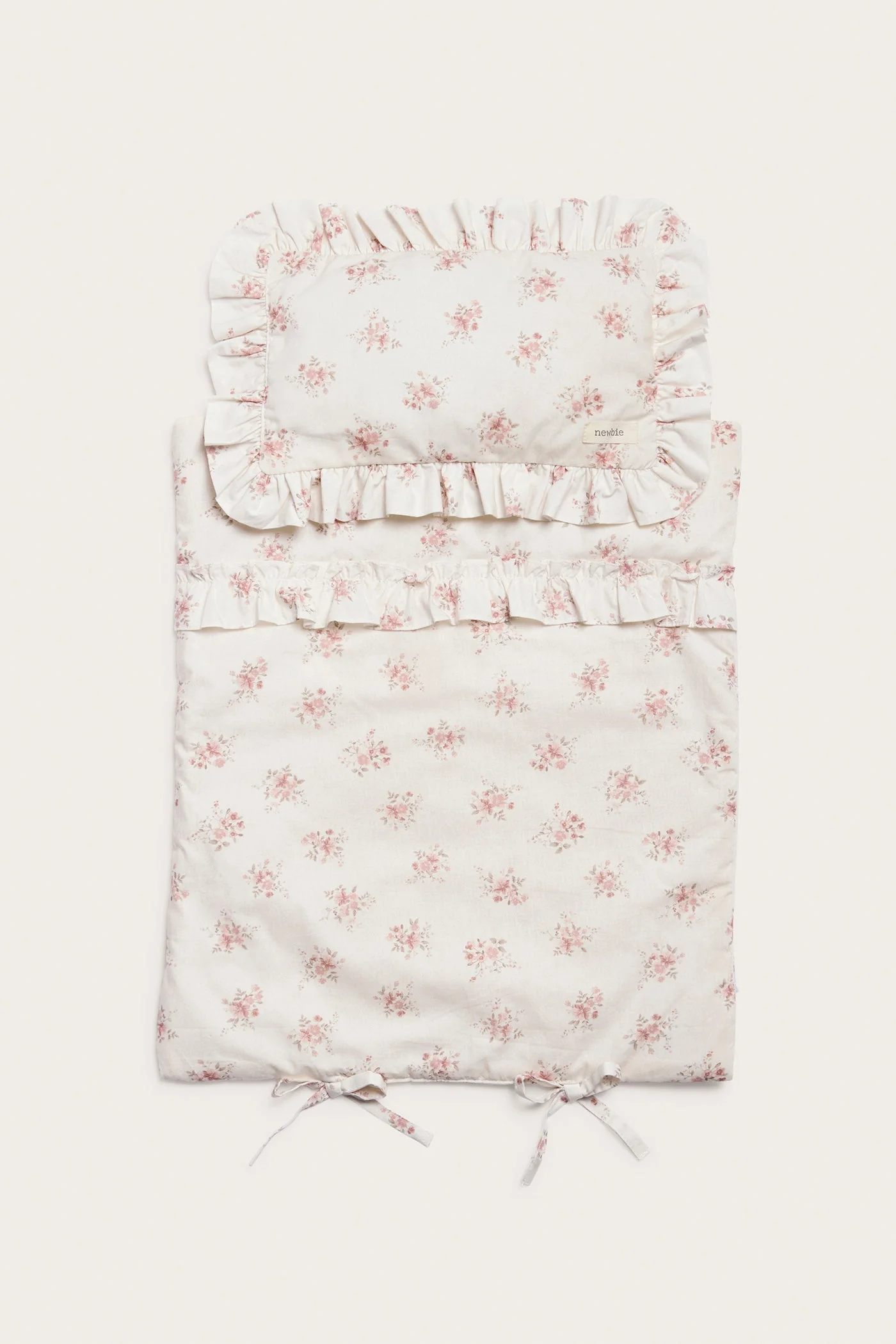 Floral bedding set for a doll bed