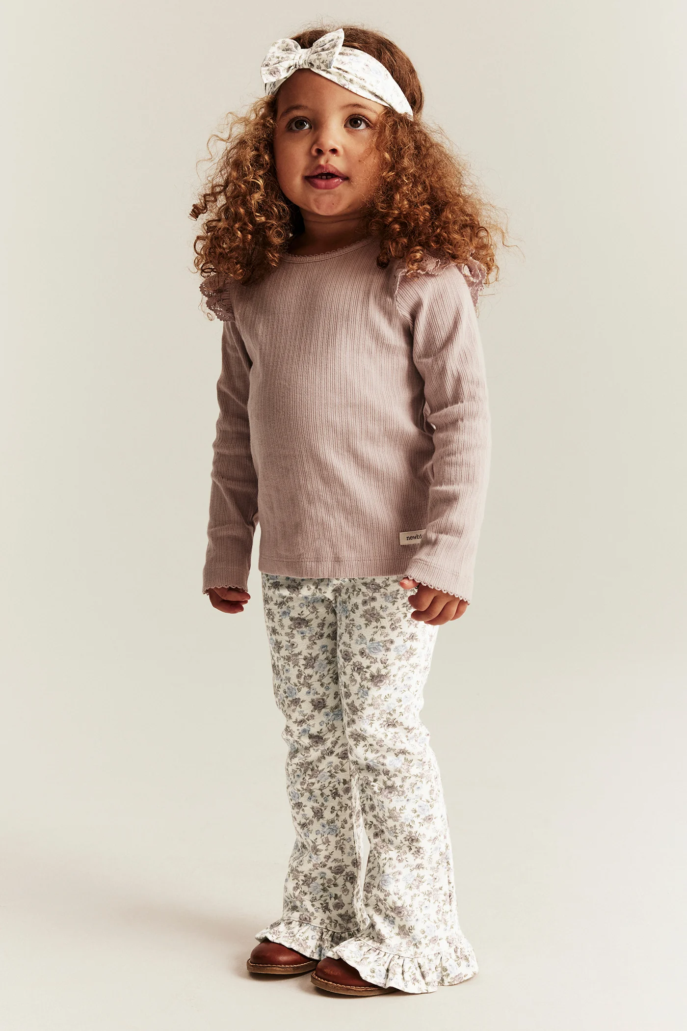 Kids' white floral jersey trousers with frill - Image 3