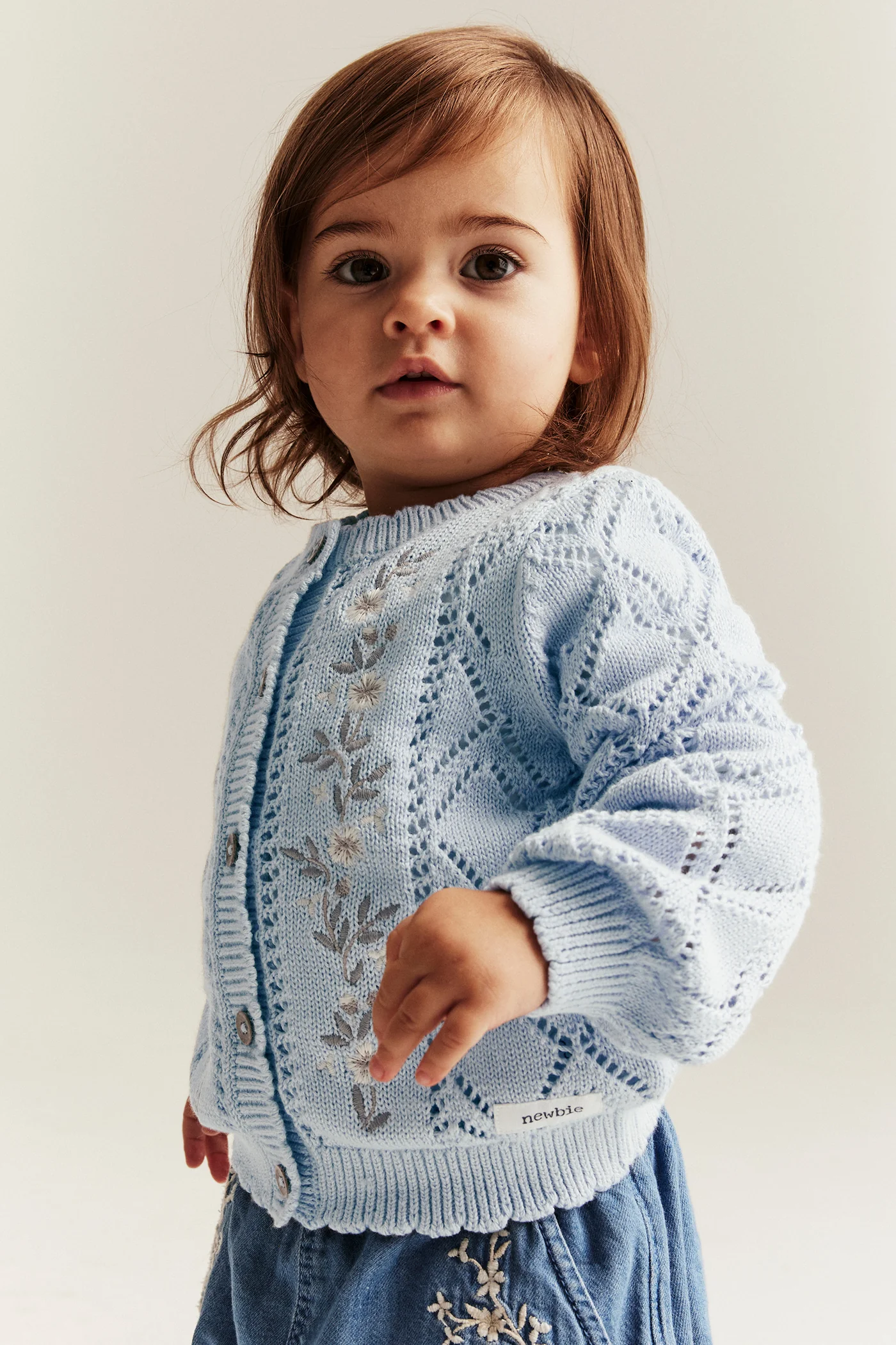 Baby blue knitted cardigan with flowers - Image 3