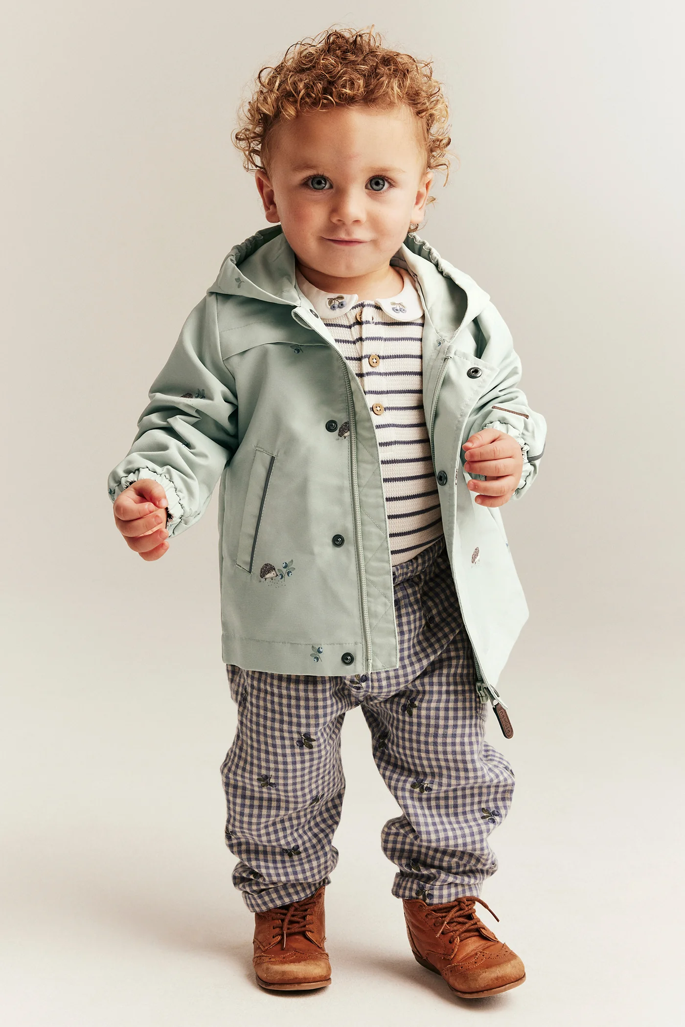 Baby & kids’ green windproof jacket with hedgehogs - Image 4