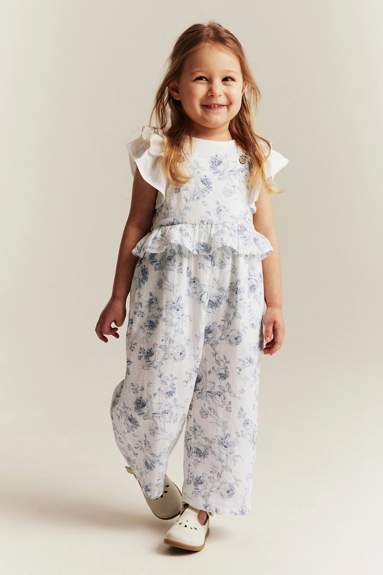 Kids floral jumpsuit with frill - Image 4