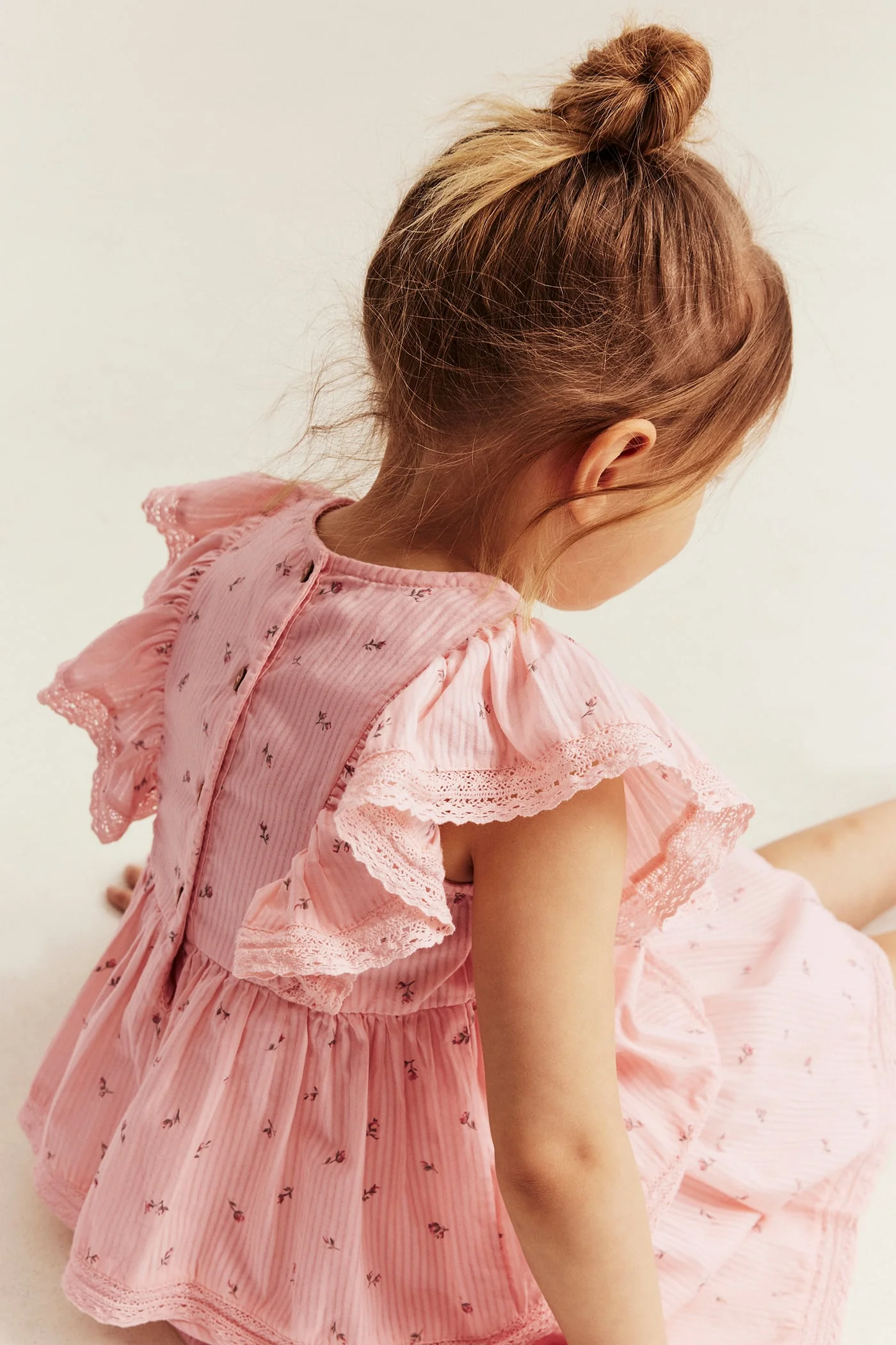 Kids pink floral frilled dress - Image 3