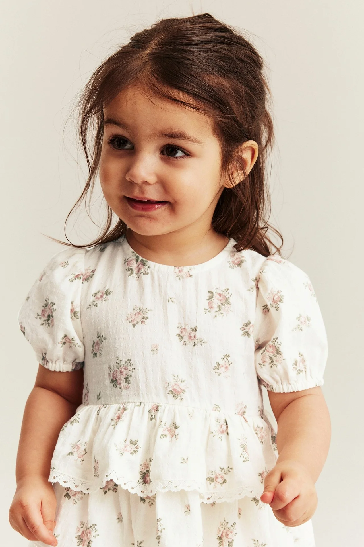Baby floral romper with frill - Image 4