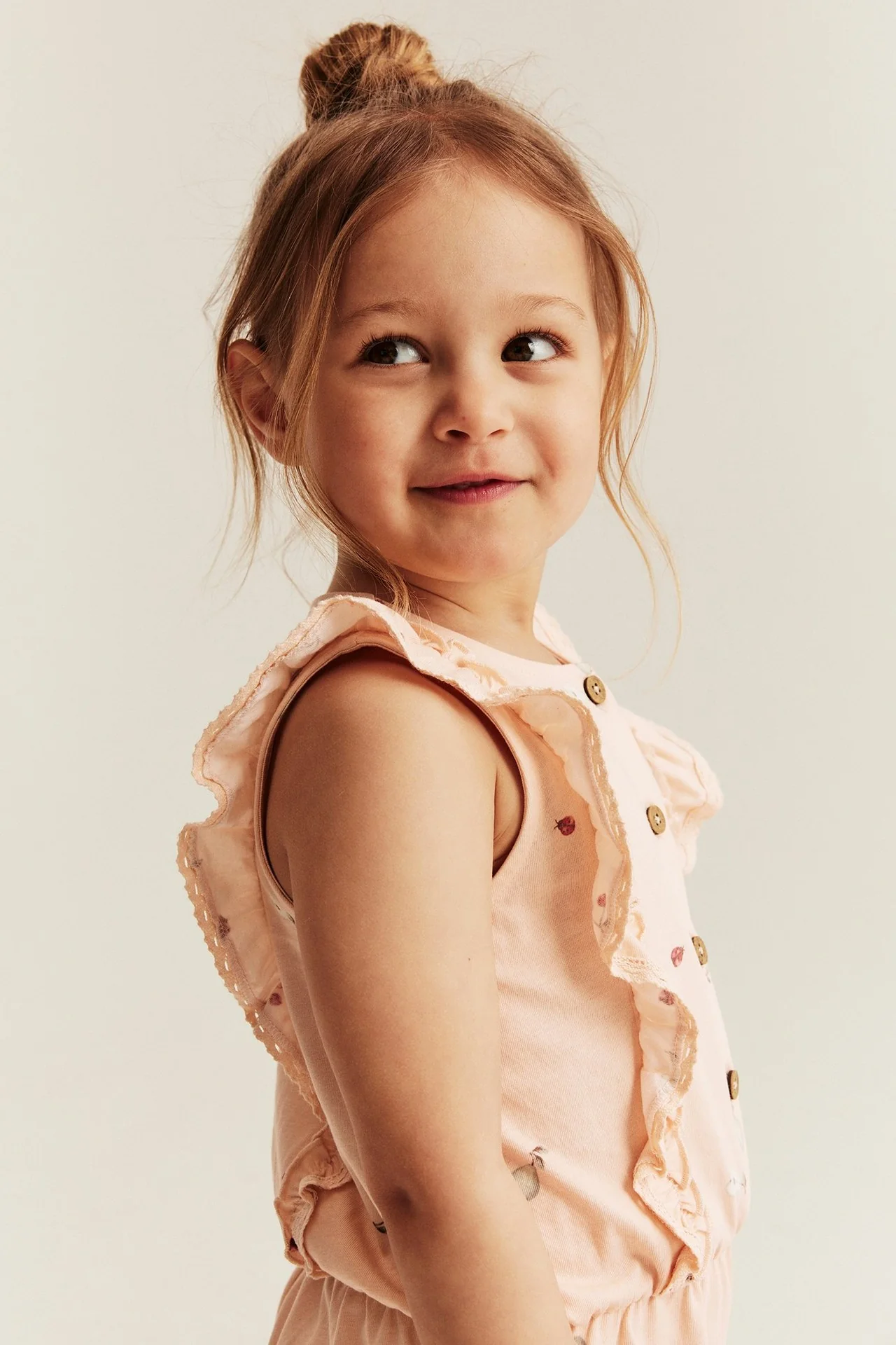Kids orange jumpsuit with frills - Image 3