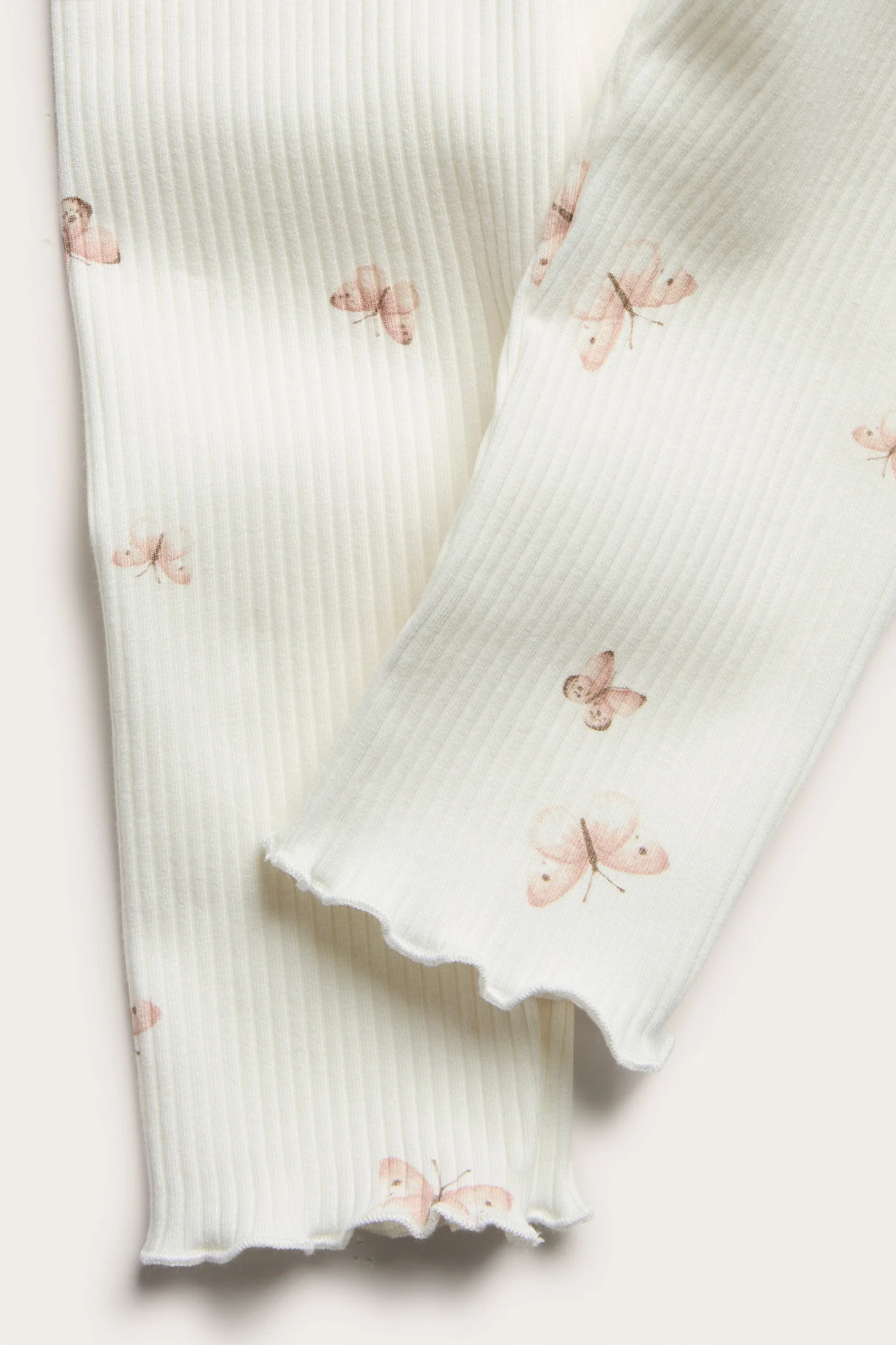 Baby white ribbed leggings with butterfly print - Image 3