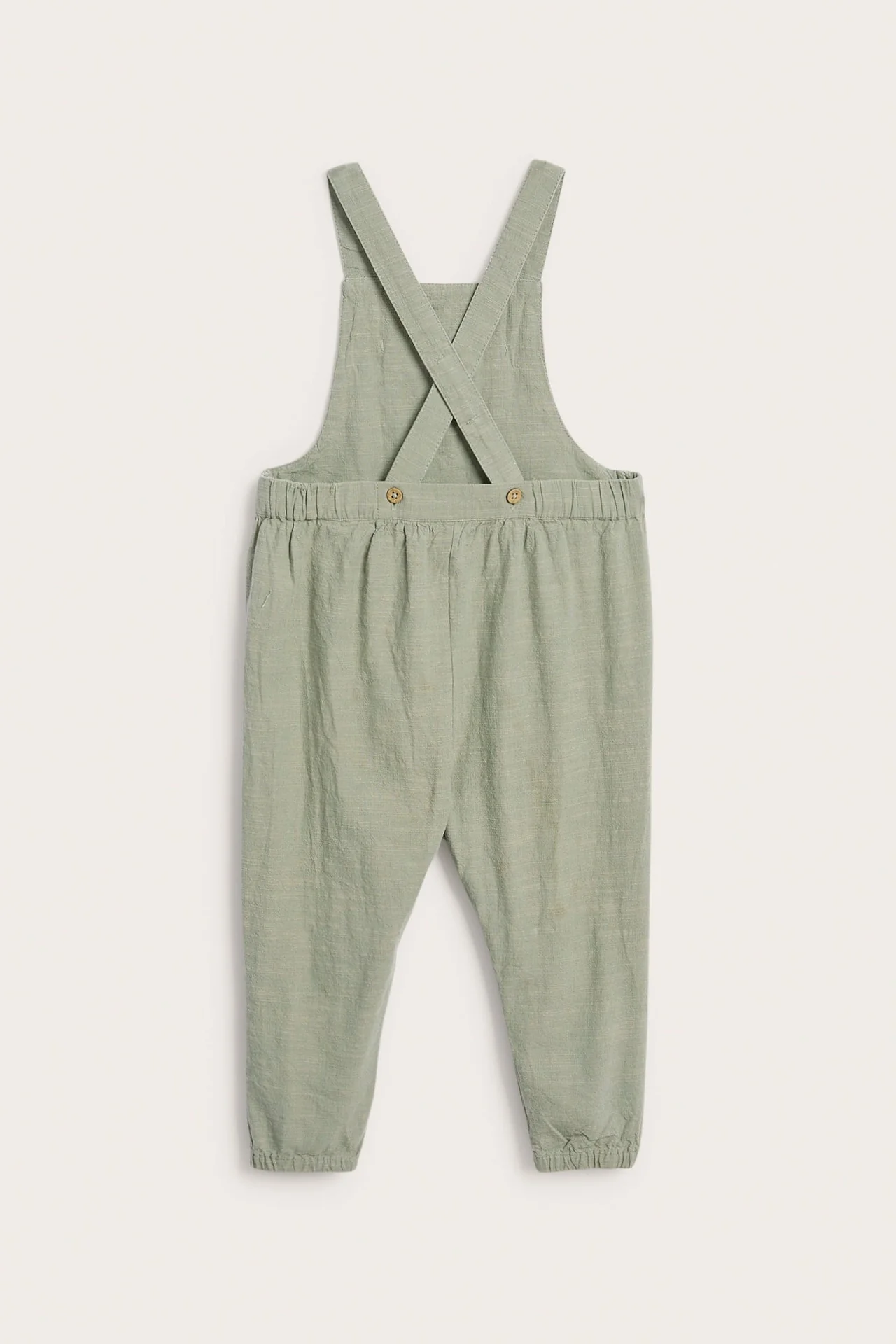 Baby green dinosaur dungarees - Image 3